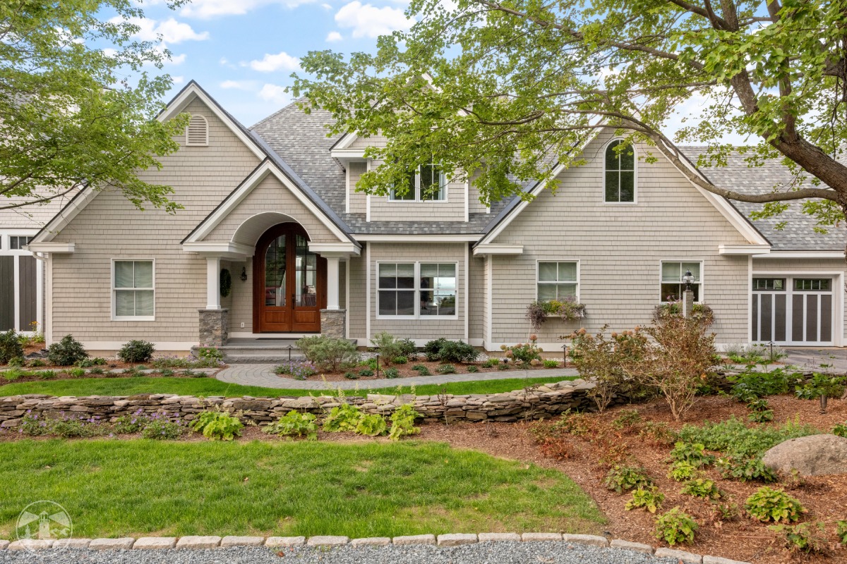 Curved double French door from LePage Millwork featured on Lakeside Legacy home in Gilford, NH